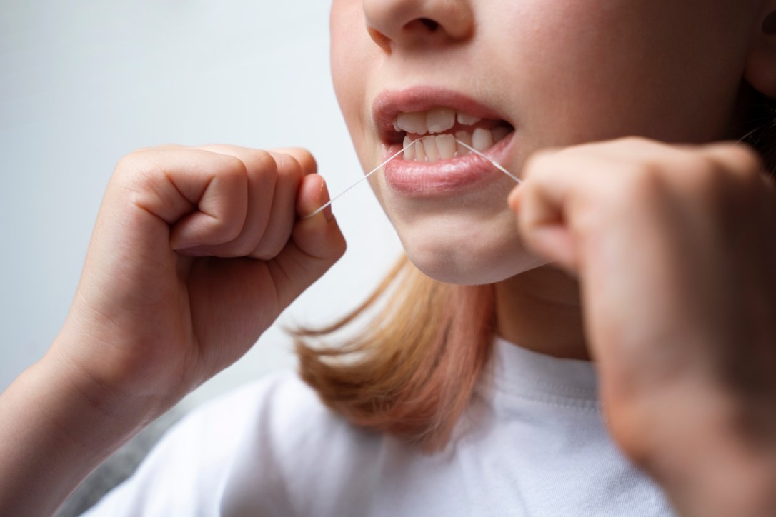To Floss or Not to Floss: Unveiling the Importance of Flossing with Gracious&nbsp;Smiles